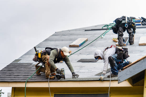 Professional Storm Damage Roof Repair technician working in Waterford, CA